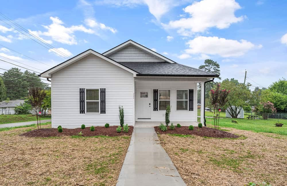 White bungalow house. ETNPMS contact