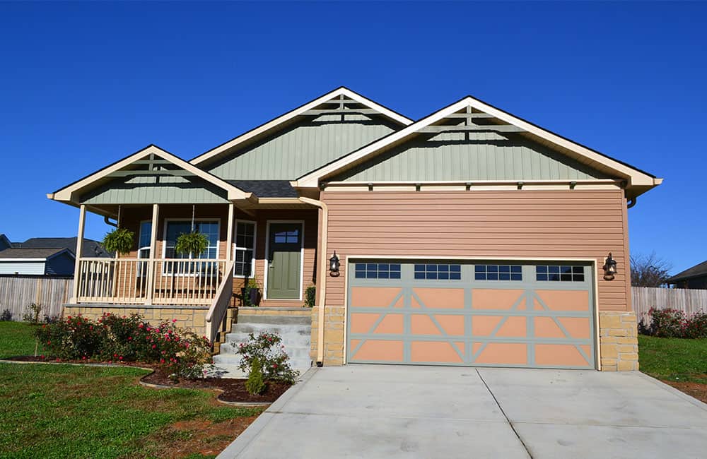 a house with a garage and driveway